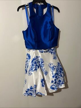 Royal blue crop top with royal blue and white floral skirt